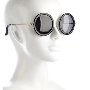 The Row round black spring hinge  sunglasses. Like new. Never been worn.